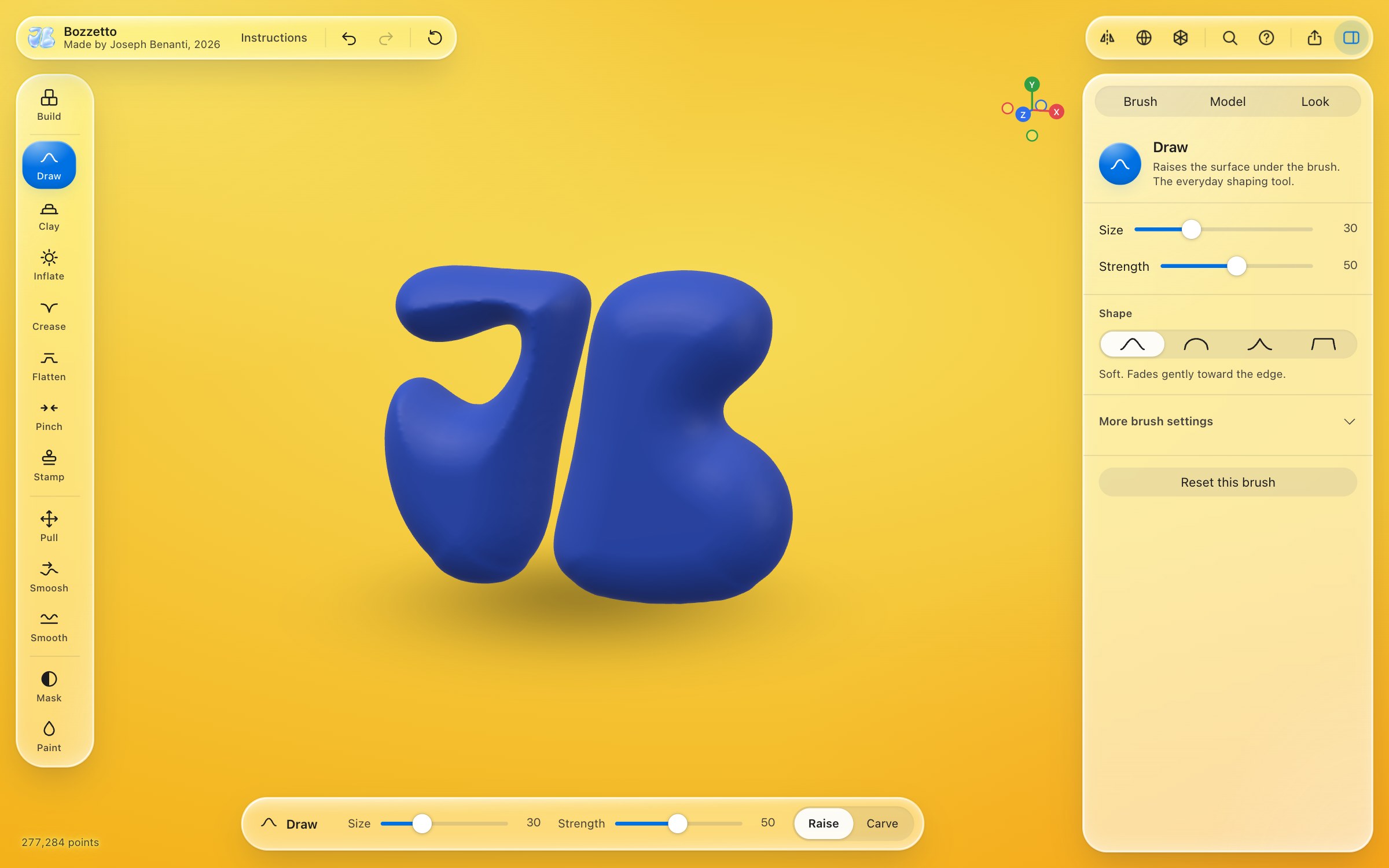 The Bozzetto window with the Benanti Designs JB mark sculpted in blue clay on a yellow background